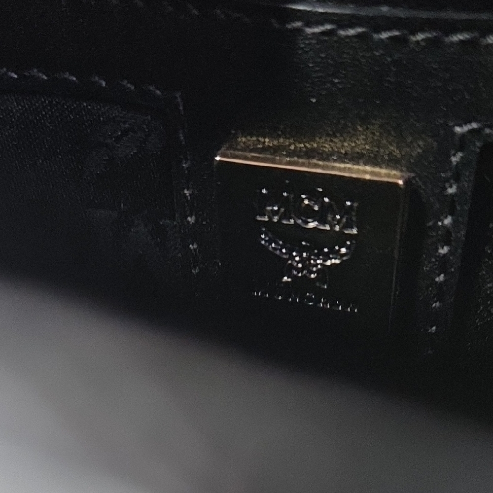 black MCM Mini crossbody bag with gold-plated hardware. - Picture 7 of 8